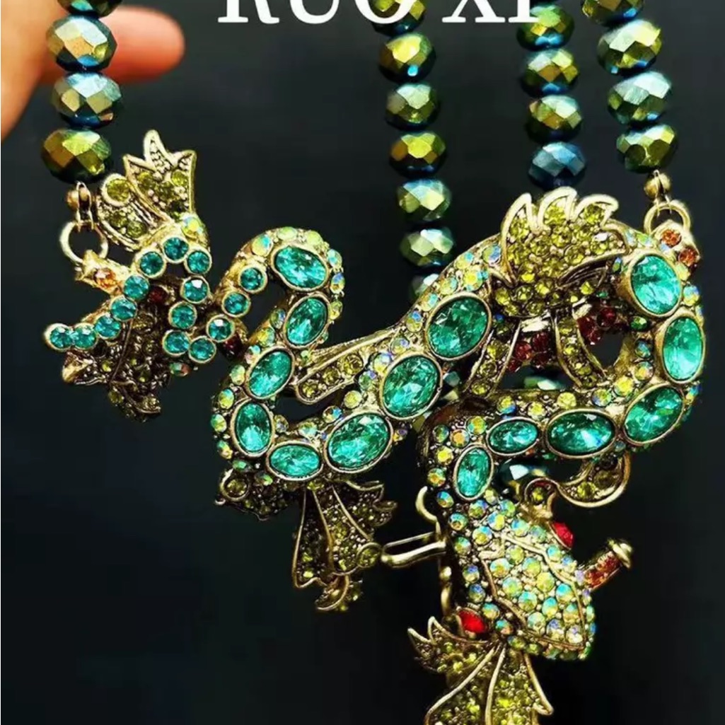 Heidi, Daus! “Night Of The Serpent “Emerald Drop Pendant